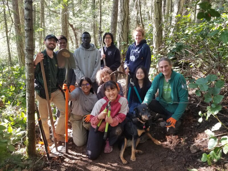 Group of people on a trail that they have been working on